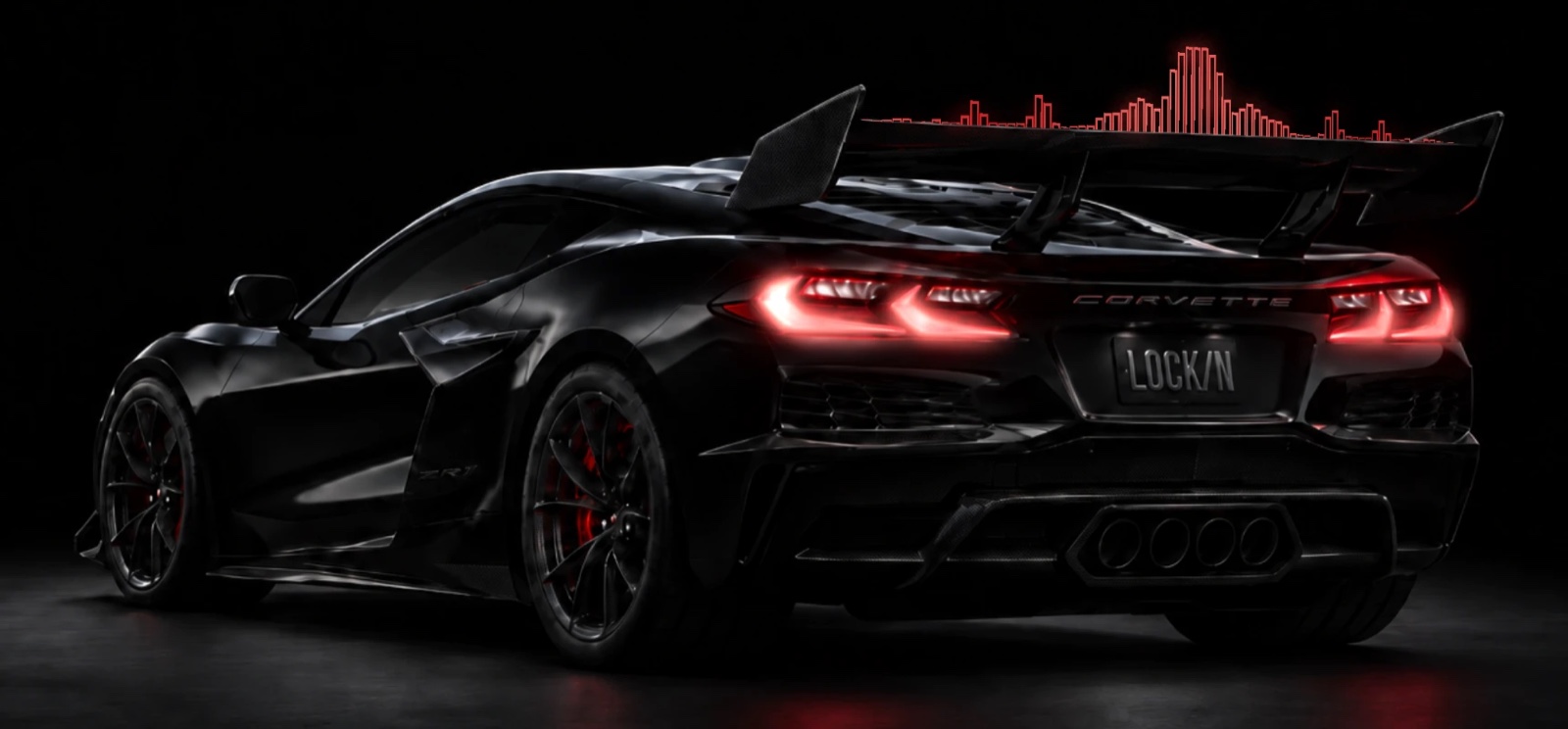 Red frequency bars standing along the rear wing of a black sports car, shorter and closer together toward the wing's far end.